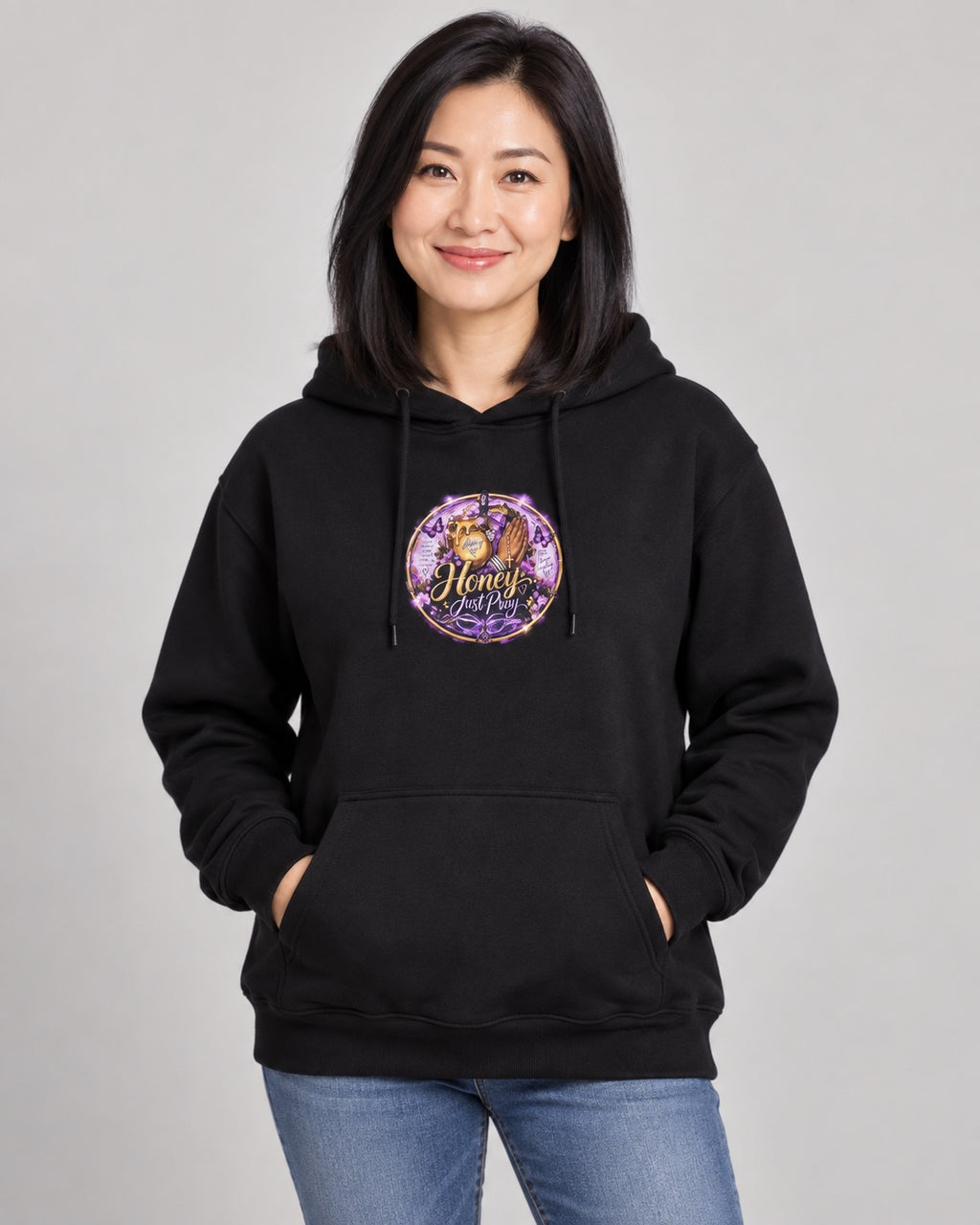 Model wearing black Honey Just Pray Signature Hoodie