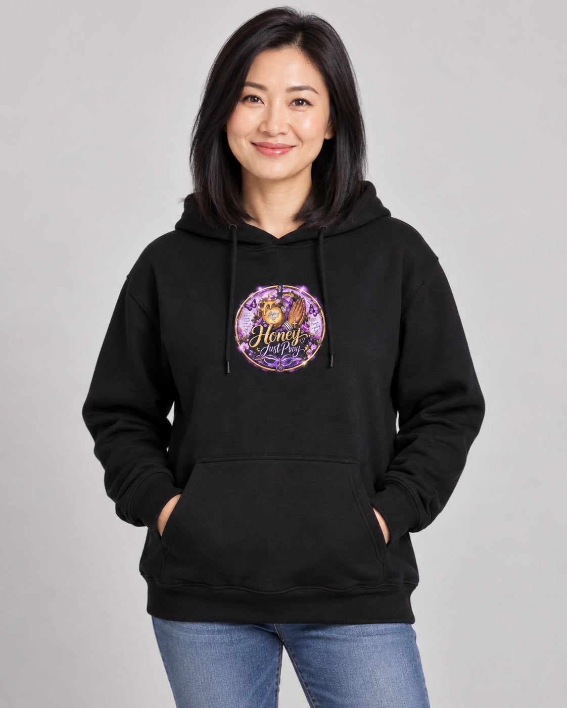 Model wearing black Honey Just Pray Signature Hoodie