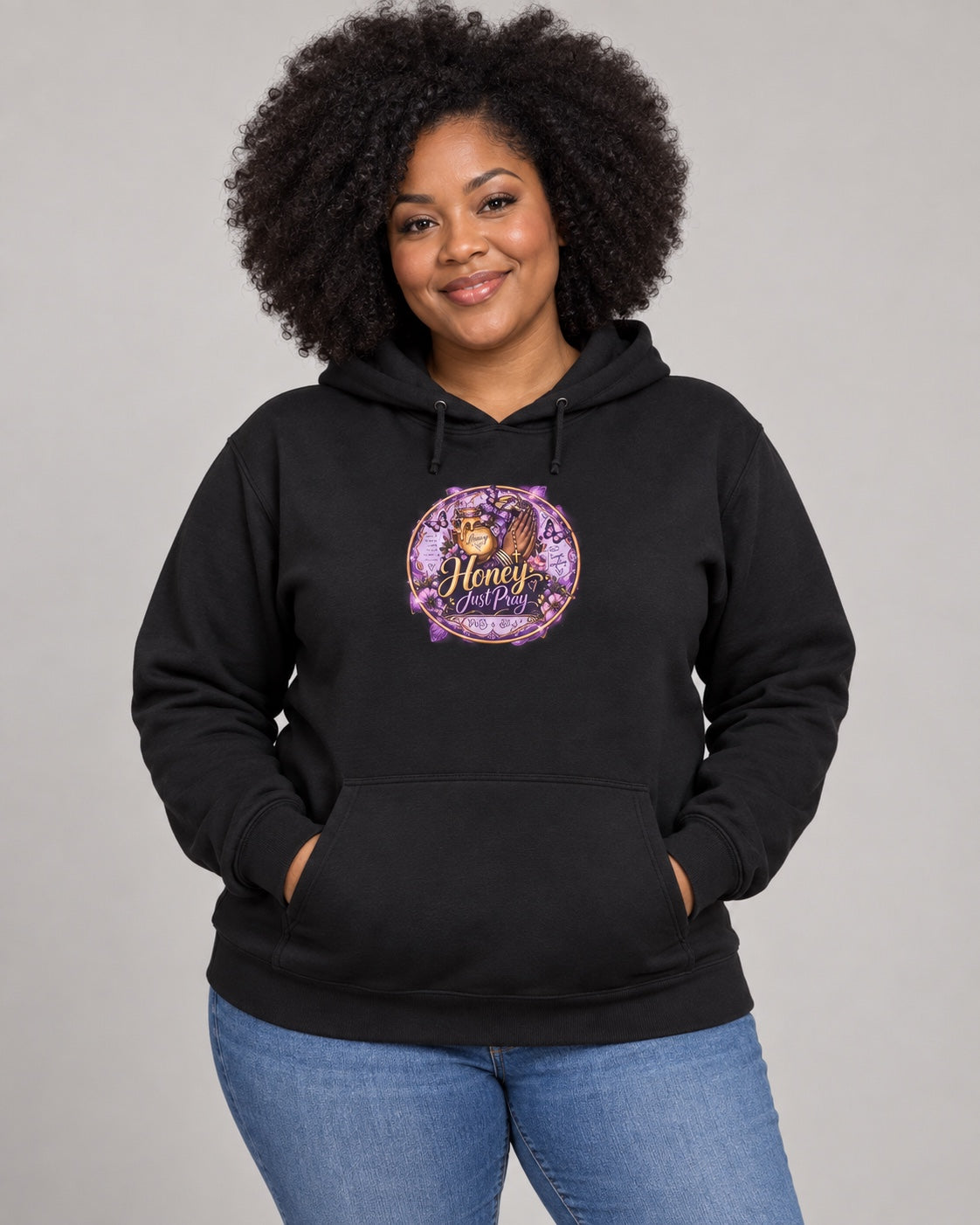 Model wearing black Honey Just Pray Signature Hoodie